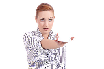 Image showing beautiful young girl is holding a blank card in hand isolated