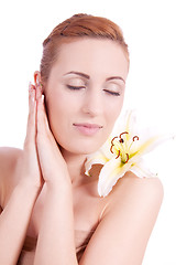 Image showing beautiful natural woman face with flower isolated 