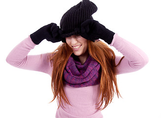 Image showing young beautiful woman with hat gloves and scarf in winter isolated