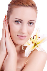 Image showing beautiful natural woman face with flower isolated 