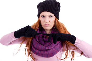 Image showing young beautiful woman with hat gloves and scarf in winter isolated