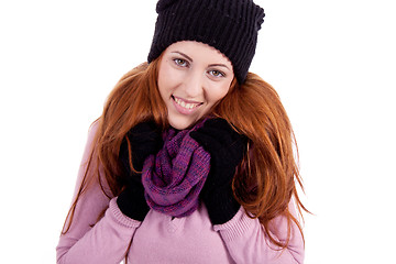 Image showing young beautiful woman with hat gloves and scarf in winter isolated