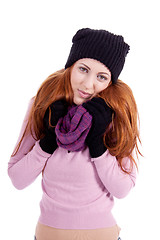 Image showing young beautiful woman with hat gloves and scarf in winter isolated