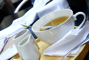 Image showing Tea time - green organic tea, white tea service 