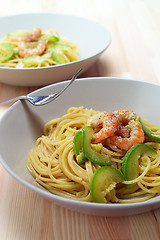 Image showing spaghetti pasta with fresh shrimps and zucchini sauce