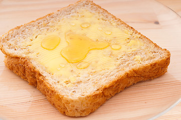Image showing bread butter and honey