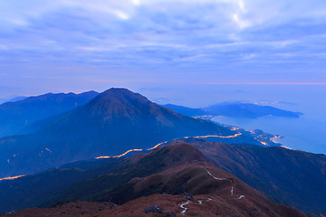 Image showing mountain at night with road