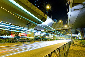 Image showing traffic with blur light through city at night