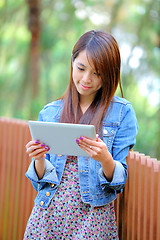 Image showing young asian woman with tablet pc