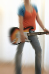 Image showing female guitarist