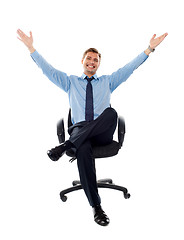 Image showing Successful businessman seated on chair