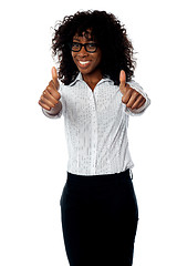 Image showing Corporate woman gesturing double thumbs up