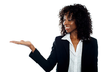 Image showing African woman with open palm. Copy space