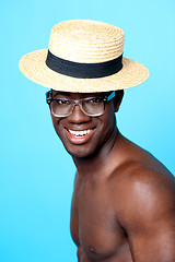 Image showing Studio portrait of young man with hat and eyewear