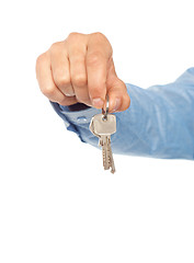 Image showing Man holding keys. Shallow DOF