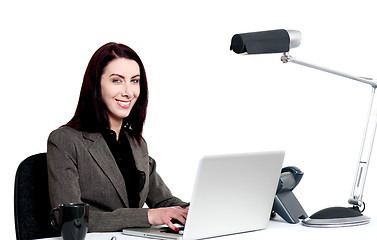 Image showing Professional corporate lady at work. Indoor shot