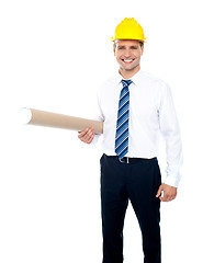 Image showing Successful male builder holding blueprints
