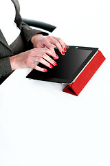 Image showing Cropped image of a businesswoman using tablet pc