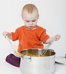 Image showing baby with big cooking pot