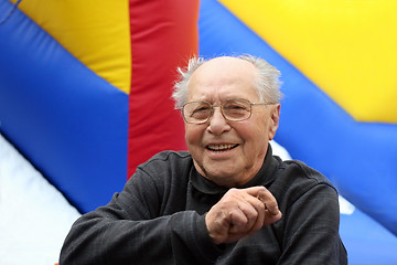 Image showing Happy senior man on a colorful background