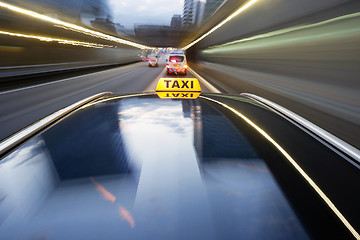 Image showing Speeding taxi