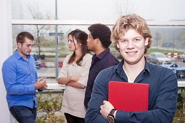 Image showing Smiling young man on a college campus