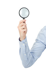 Image showing  hand holding magnifying glass