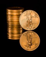 Image showing Reflection of one ounce gold coin black
