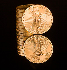 Image showing Reflection of one ounce gold coin black