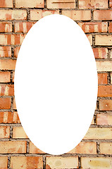 Image showing Red brick wall frame and isolated white oval 