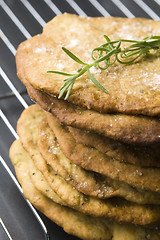 Image showing Homemade rustical crackers with rosemary