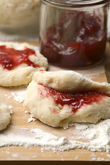 Image showing Sweet doughnuts with rose marmelade