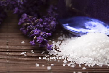 Image showing Lavender flowers and the bath salt and essential oil