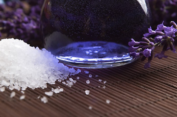 Image showing Lavender flowers and the bath salt and essential oil