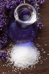 Image showing Lavender flowers and the bath salt and essential oil