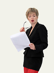 Image showing Businesswoman reading a paper