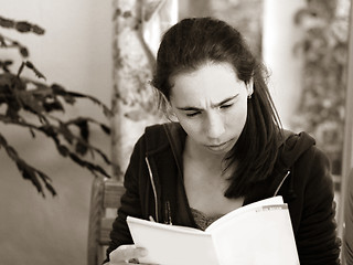 Image showing Girl reading a book