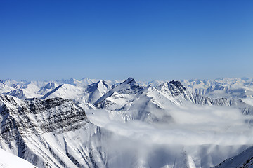 Image showing Snowy mountains in haze