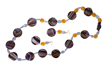 Image showing necklace and earrings from buttons and beads on a white backgrou