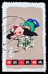 Image showing CHINA - CIRCA 1963: A stamp printed in China shows playing boy, 