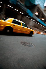 Image showing Speeding Yellow City Taxi Cab