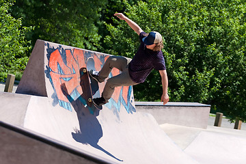 Image showing Skater Riding a Skate Ramp