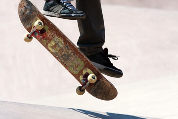 Image showing Skateboarder Jumping Tricks