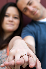 Image showing Engaged Couple Shows Diamond Ring