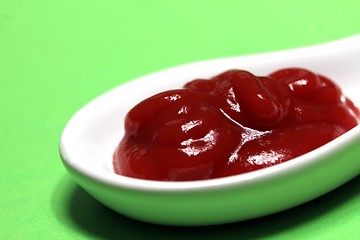 Image showing ketchup on a porcelain spoon