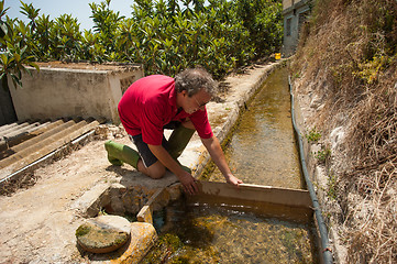 Image showing Traditional irrigation job 