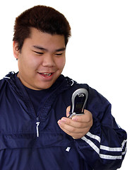 Image showing Asian teenage boy with phone