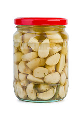 Image showing Glass jar with marinated garlic