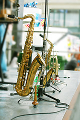 Image showing golden saxophone alto on stage 