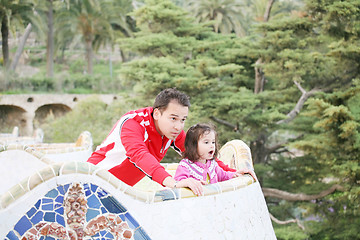 Image showing Father and daughter with a surprised looking in a big balcony